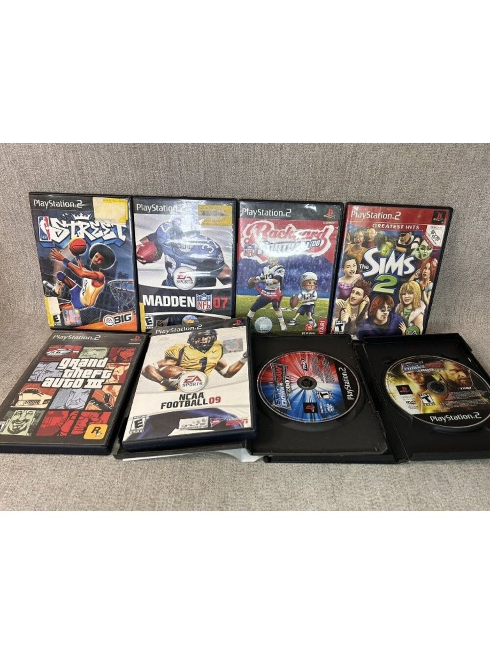 Playstation 2 (PS2) Game Lot Of 8 Untested Sims Grand Auto III Smack Down Vs Raw